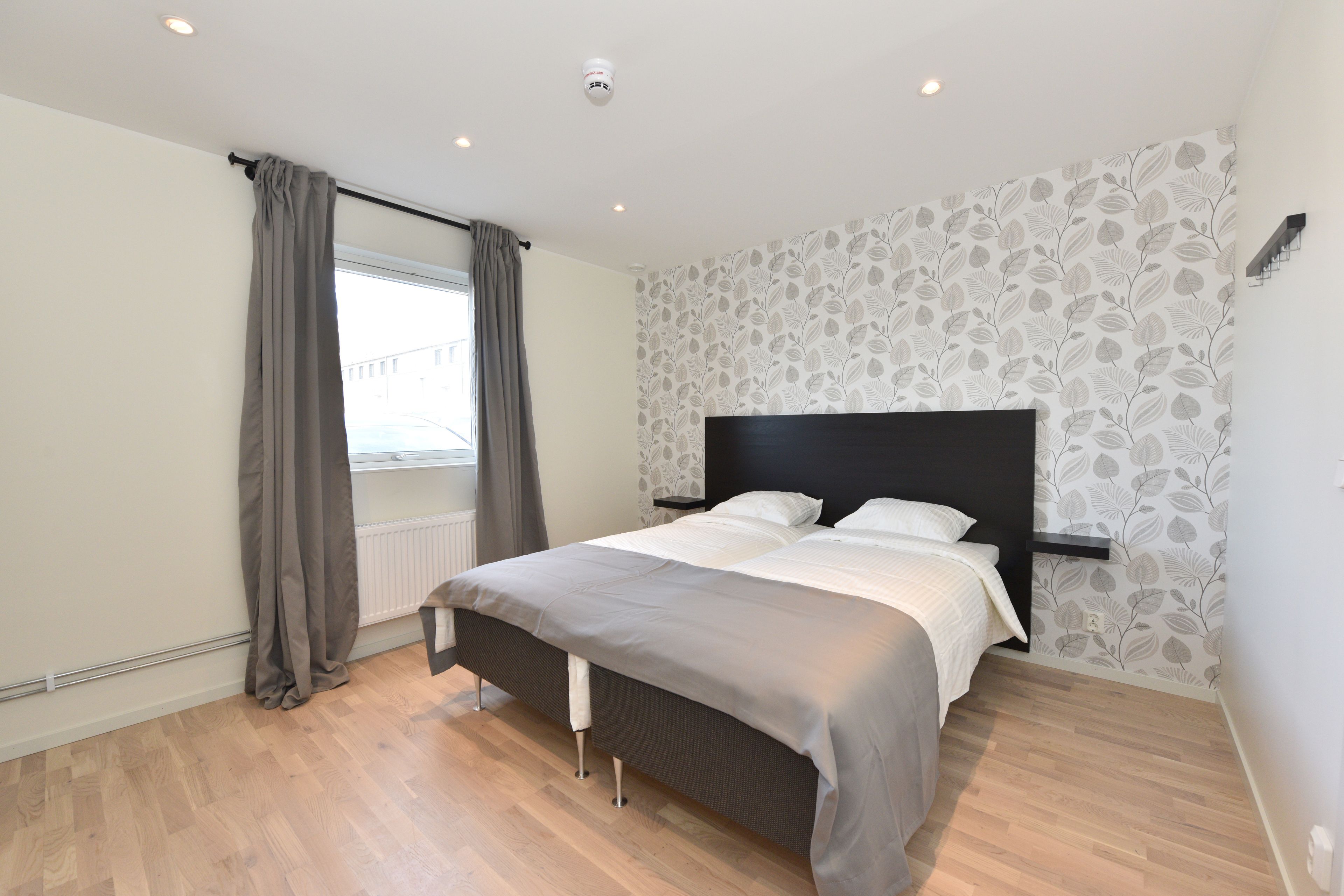 standard twin room, 2 single beds, shared bathroom | blackout curtains, soundproofing, free wifi, bed sheets