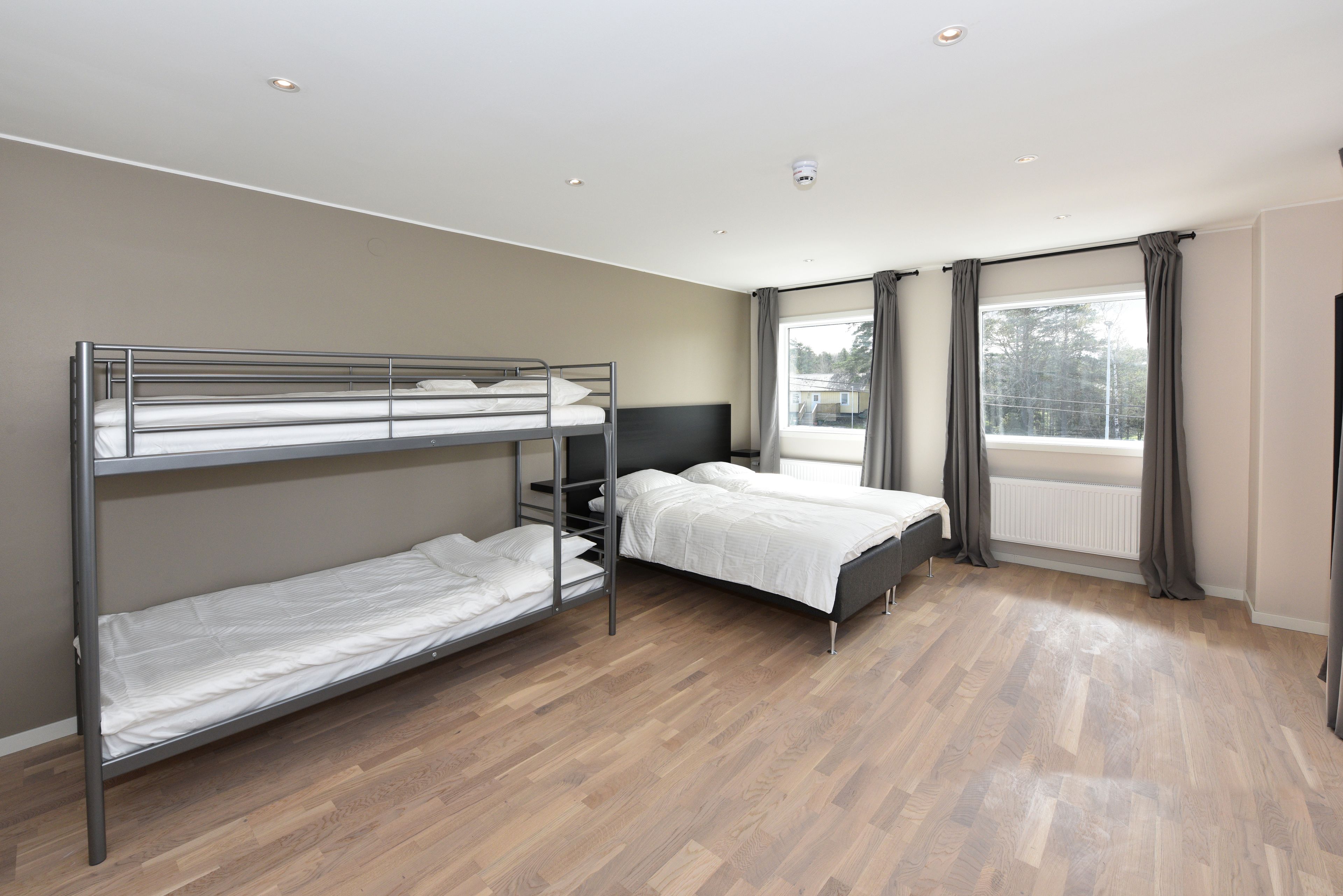 basic quadruple room, multiple beds, shared bathroom | blackout curtains, soundproofing, free wifi, bed sheets