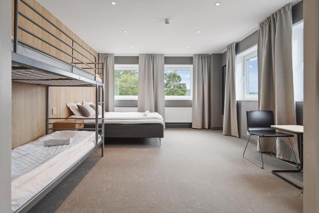 Basic Quadruple Room, Multiple Beds, Shared Bathroom | Blackout curtains, soundproofing, free WiFi, bed sheets