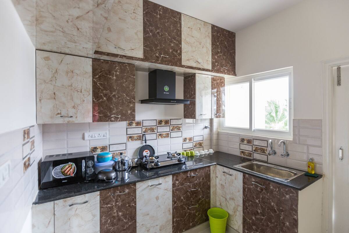 Apartemen Junior, Beberapa Tempat Tidur, Bebas Asap Rokok | Dapur pribadi | Mesin pembuat kopi/teh, lemari es besar, microwave, dan kompor