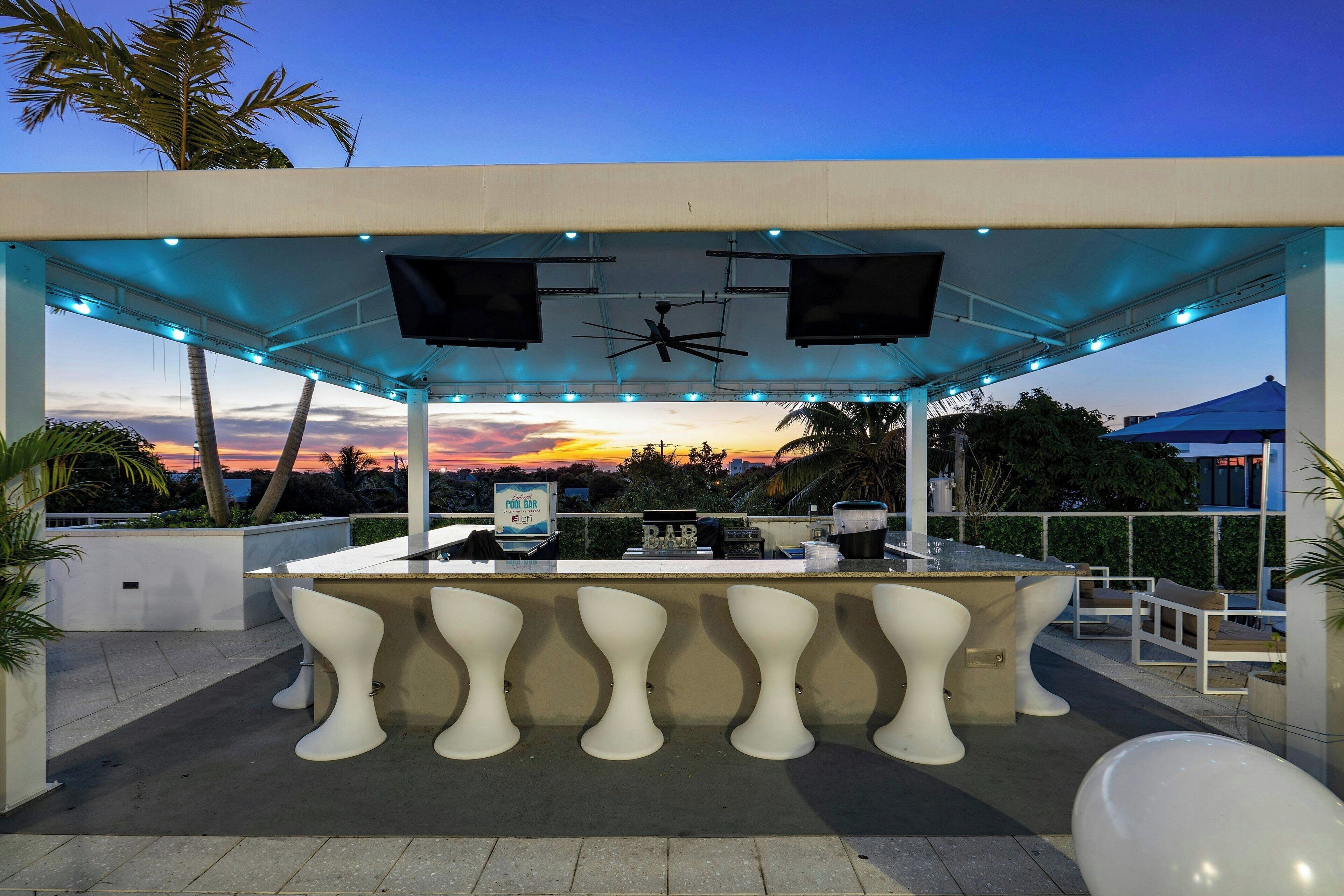 Outdoor pool, open 8 AM to 8 PM, free pool cabanas, pool loungers