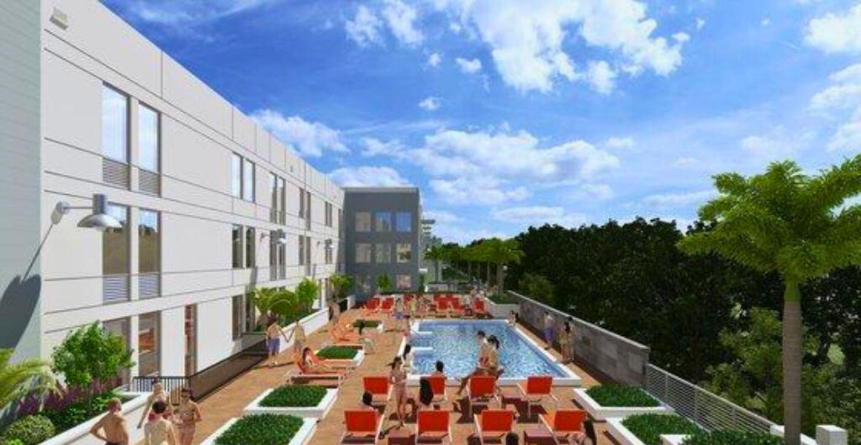 Un edificio moderno con zona de piscina en la azotea, que incluye tumbonas y una piscina.