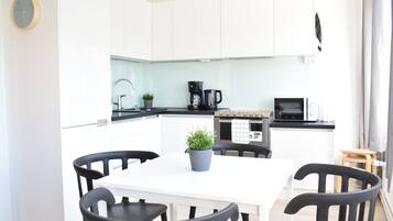 Desk, blackout curtains, soundproofing, iron/ironing board