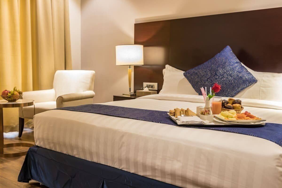 Deluxe-Doppel- oder -Zweibettzimmer, 1 Einzelbett, barrierefrei | Essbereich im Zimmer