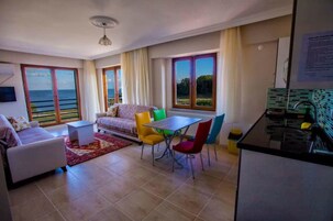 Apartment, Sea View | Living area | LCD TV