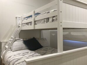 2 Bedroom House (1 Queen, 1 Tri-bunk, 1 Double Sofabed)