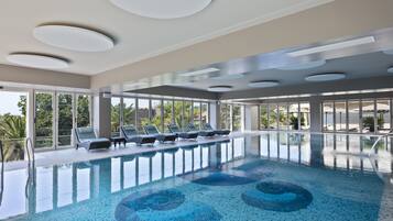 Indoor pool, outdoor pool, pool umbrellas, sun loungers