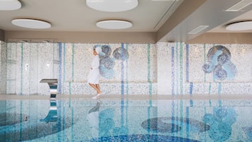 Indoor pool, outdoor pool, pool umbrellas, pool loungers