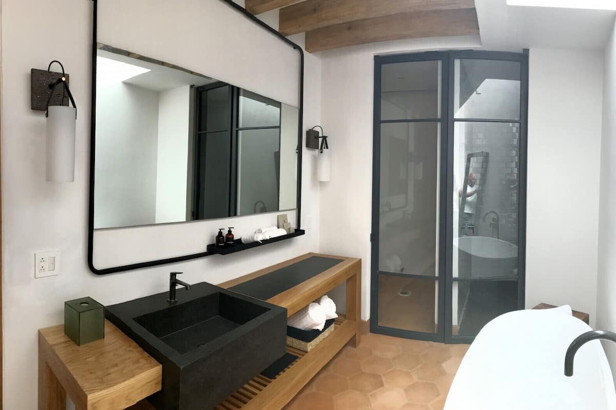 premium room, 1 king bed, ensuite | bathroom | hair dryer, bathrobes, towels, soap