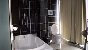 Deep soaking tub, rainfall showerhead, free toiletries, hair dryer