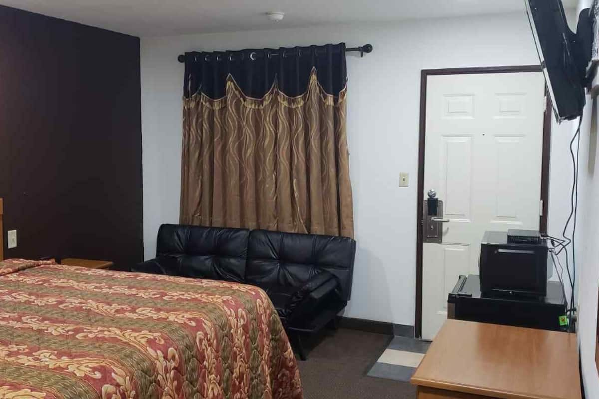 Kamer, 1 kingsize bed, niet-roken | Een bureau, een strijkplank/strijkijzer, gratis wifi, beddengoed