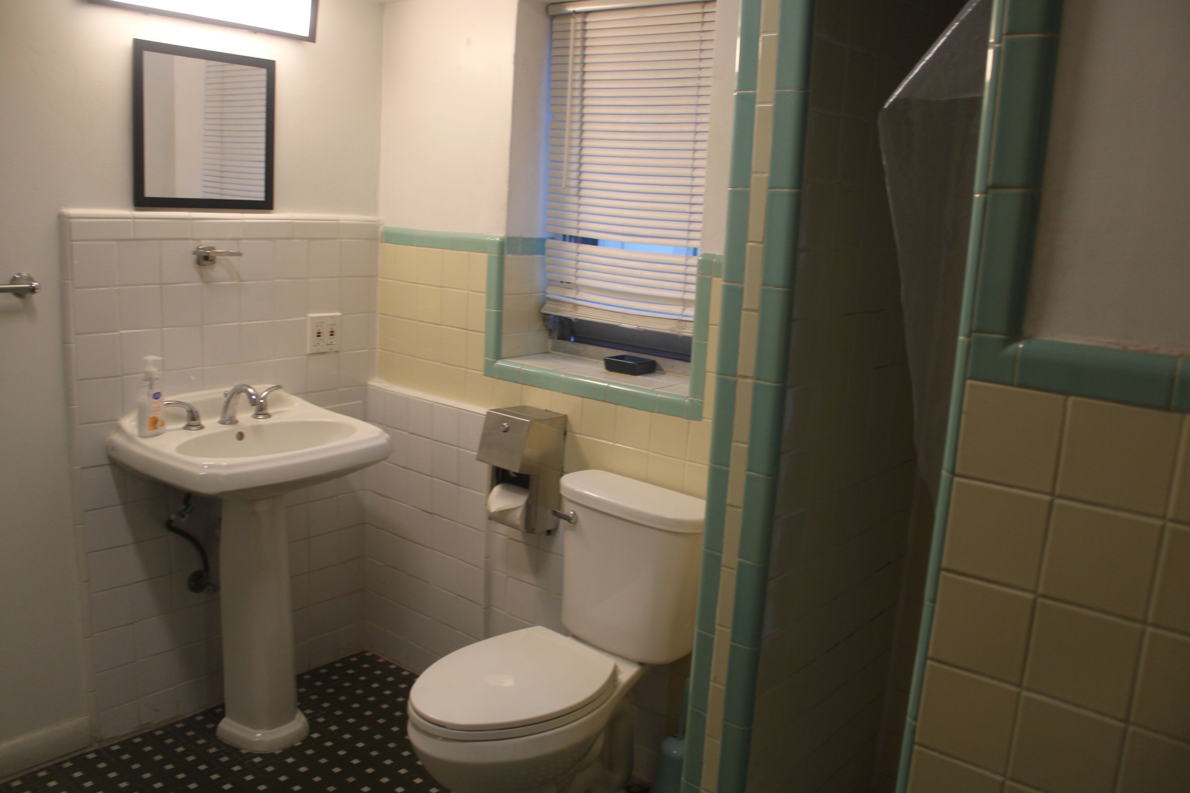 Basic Shared Dormitory | Bathroom | Deep soaking tub, towels