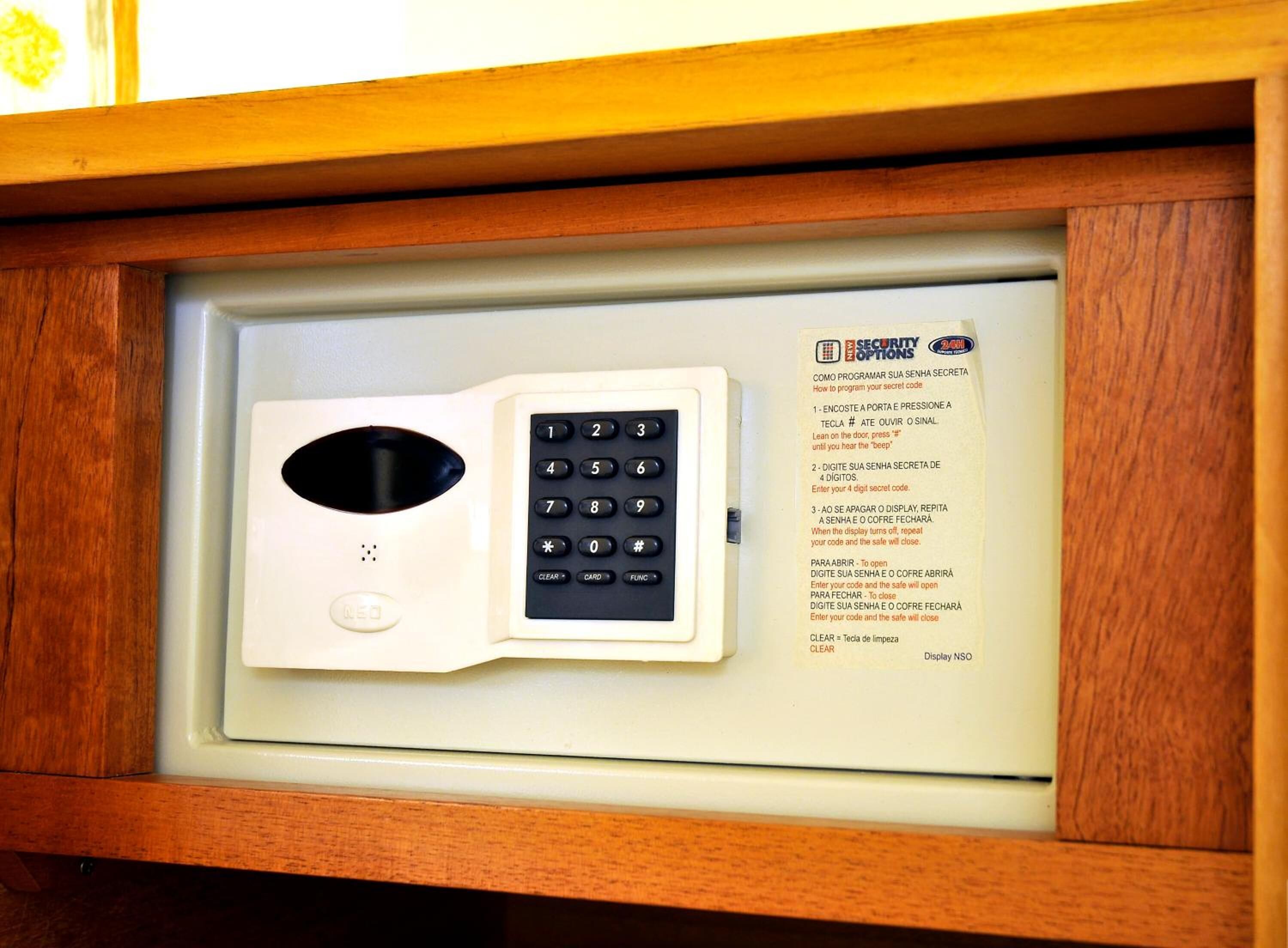 A security keypad with instructions in multiple languages.