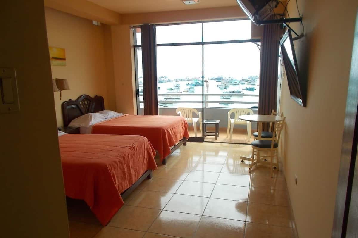 Family Quadruple Room, 2 Queen Beds, Balcony, Bay View | In-room safe, desk, rollaway beds, free WiFi
