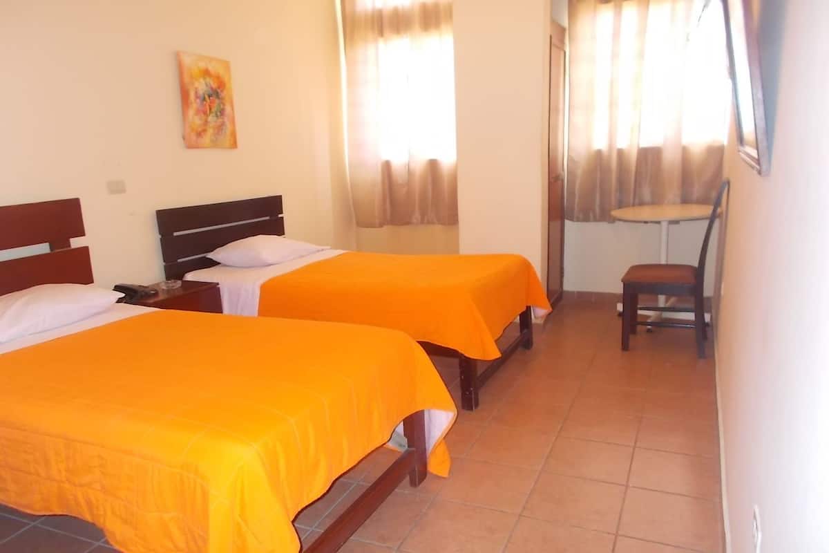 Double Room, Multiple Beds, Courtyard View | In-room safe, desk, rollaway beds, free WiFi
