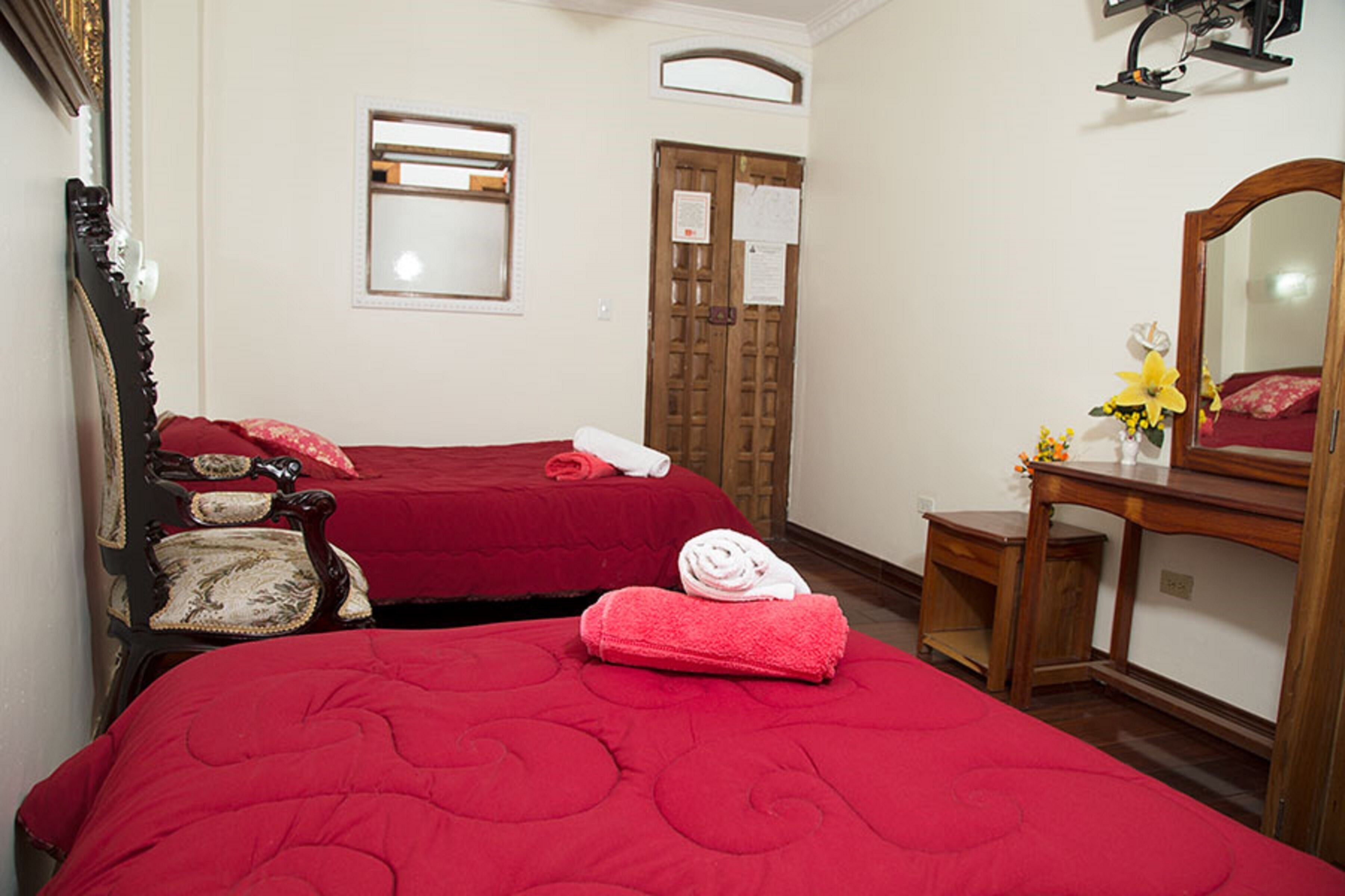 desk, blackout curtains, free wifi, bed sheets