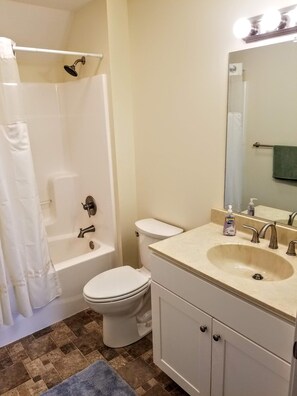 Hair dryer, towels, soap, shampoo