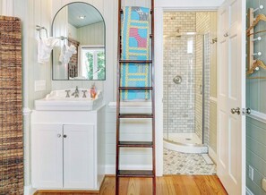 Shower, hair dryer, shampoo