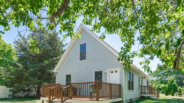 A single-story house with a front deck and a small porch. - Beautiful 3 bedroom  2 bath Home / Close to Town & Beach (Oak Bluffs)