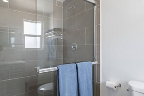 Shower, hair dryer, towels, soap