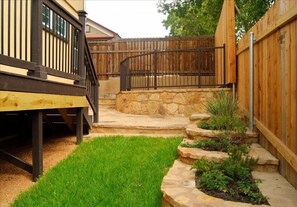 More outdoor living area beautifully landscaped and fenced in!