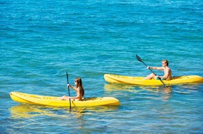 Guests can kayak on the calm waters.