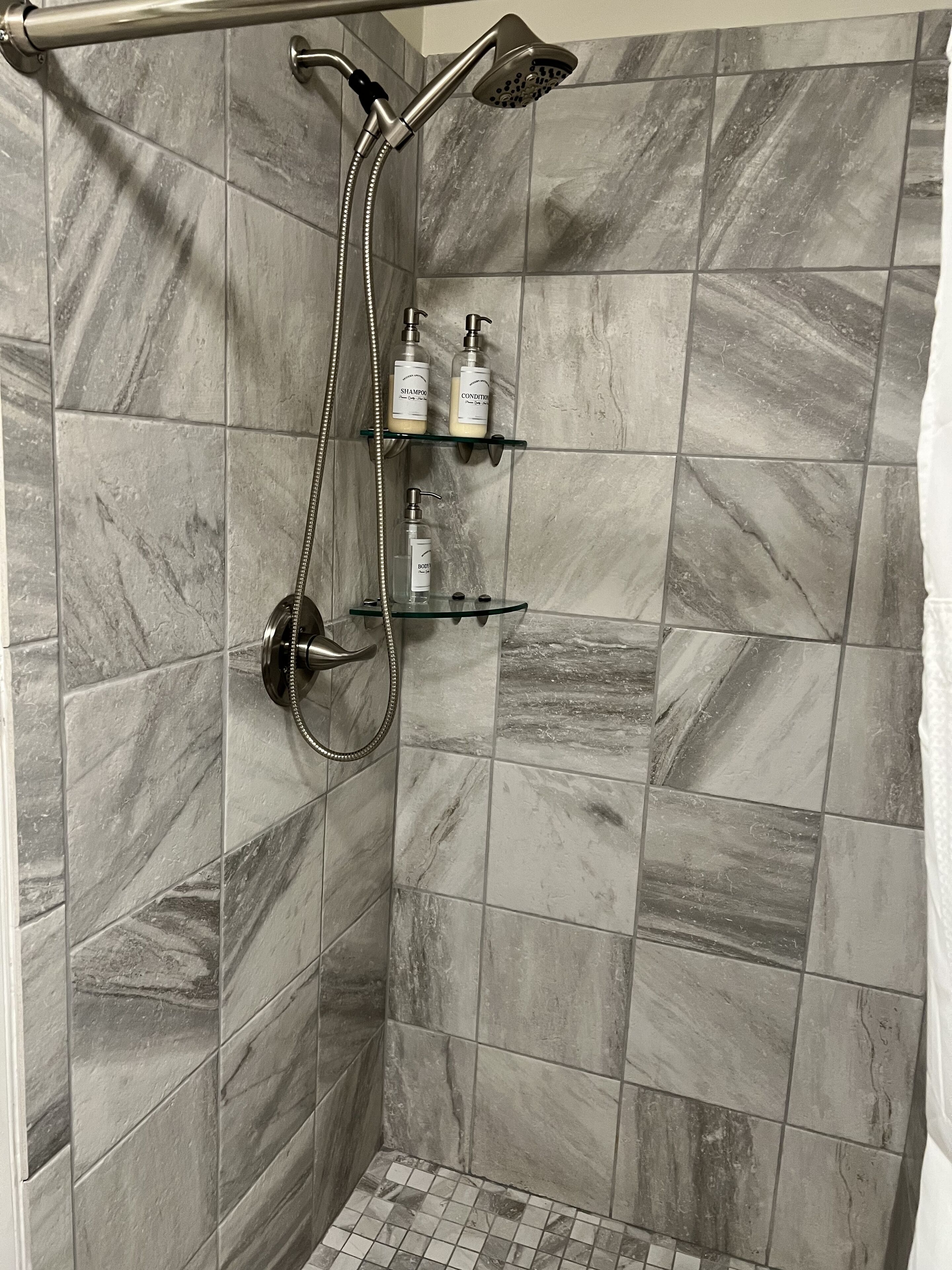 Hair dryer, towels, soap, shampoo