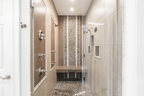 Combined shower/tub, hair dryer, towels, soap