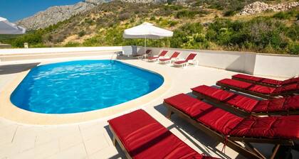 Beautiful apartment for 4 guests with A/C, WIFI, pool, terrace, pets allowed and panoramic view