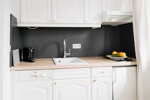 Fridge, dishwasher, high chair