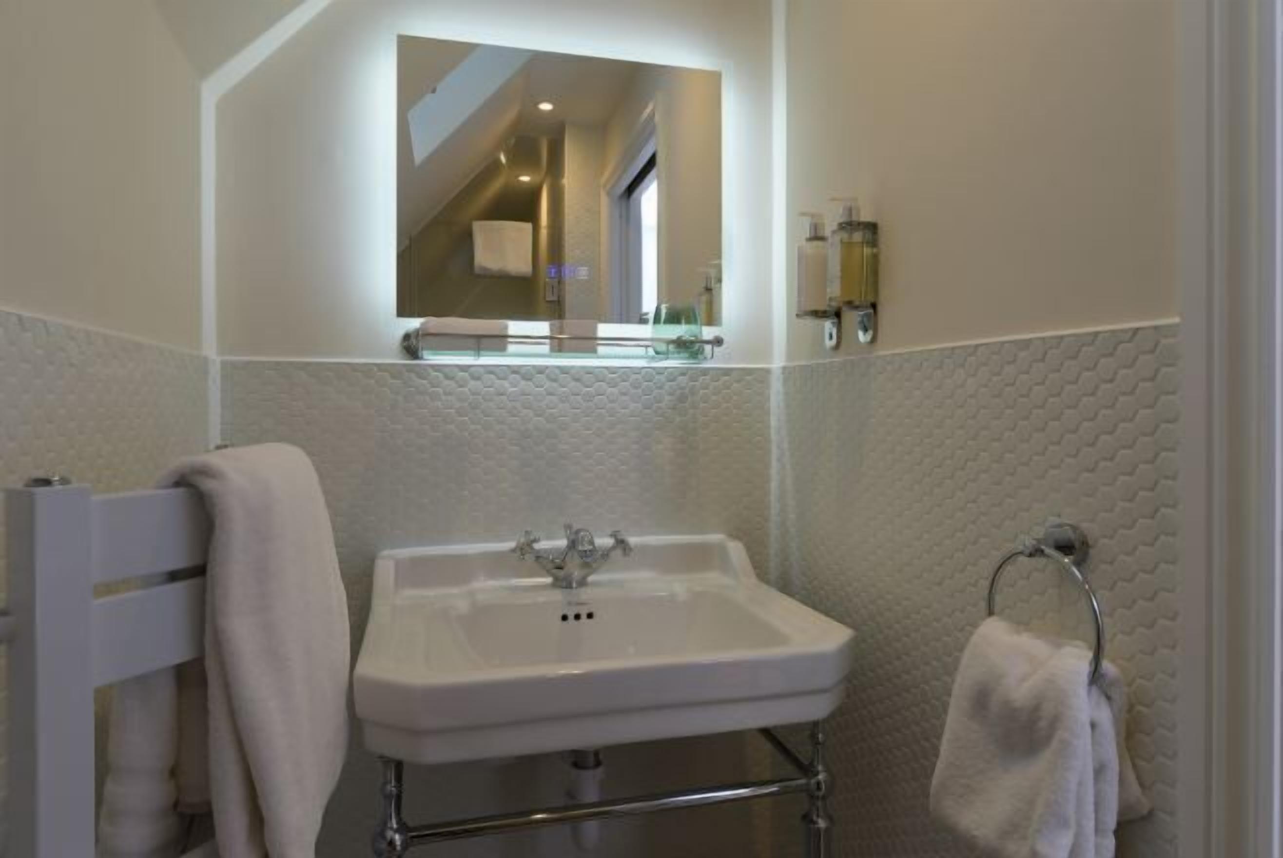 Bathroom | Free toiletries, hair dryer, slippers, towels