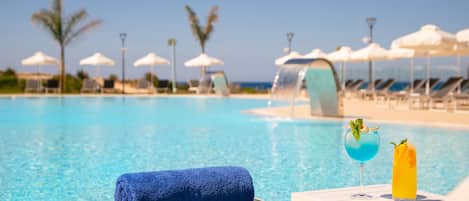 Indoor pool, outdoor pool, open 9:30 AM to 7 PM, sun loungers