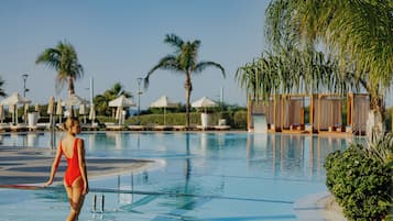 Indoor pool, outdoor pool, open 9:30 AM to 7 PM, pool loungers