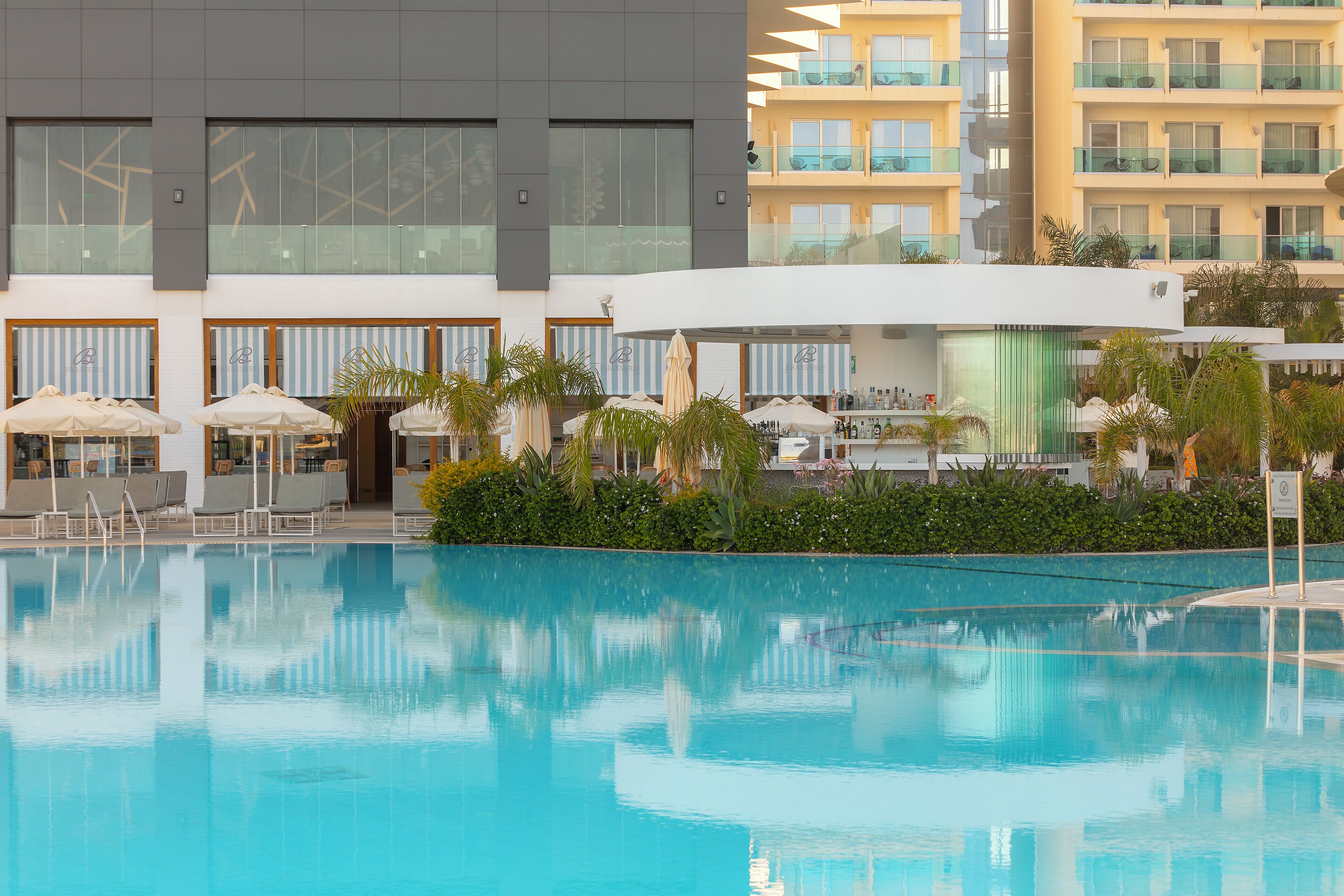 indoor pool, outdoor pool, open 9:30 am to 7 pm, pool loungers