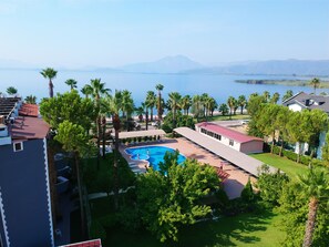 Outdoor pool, pool umbrellas, sun loungers
