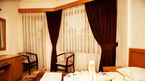 Standard Triple Room | Minibar, desk, blackout drapes, soundproofing - Panorama Plaza (Koycegiz)
