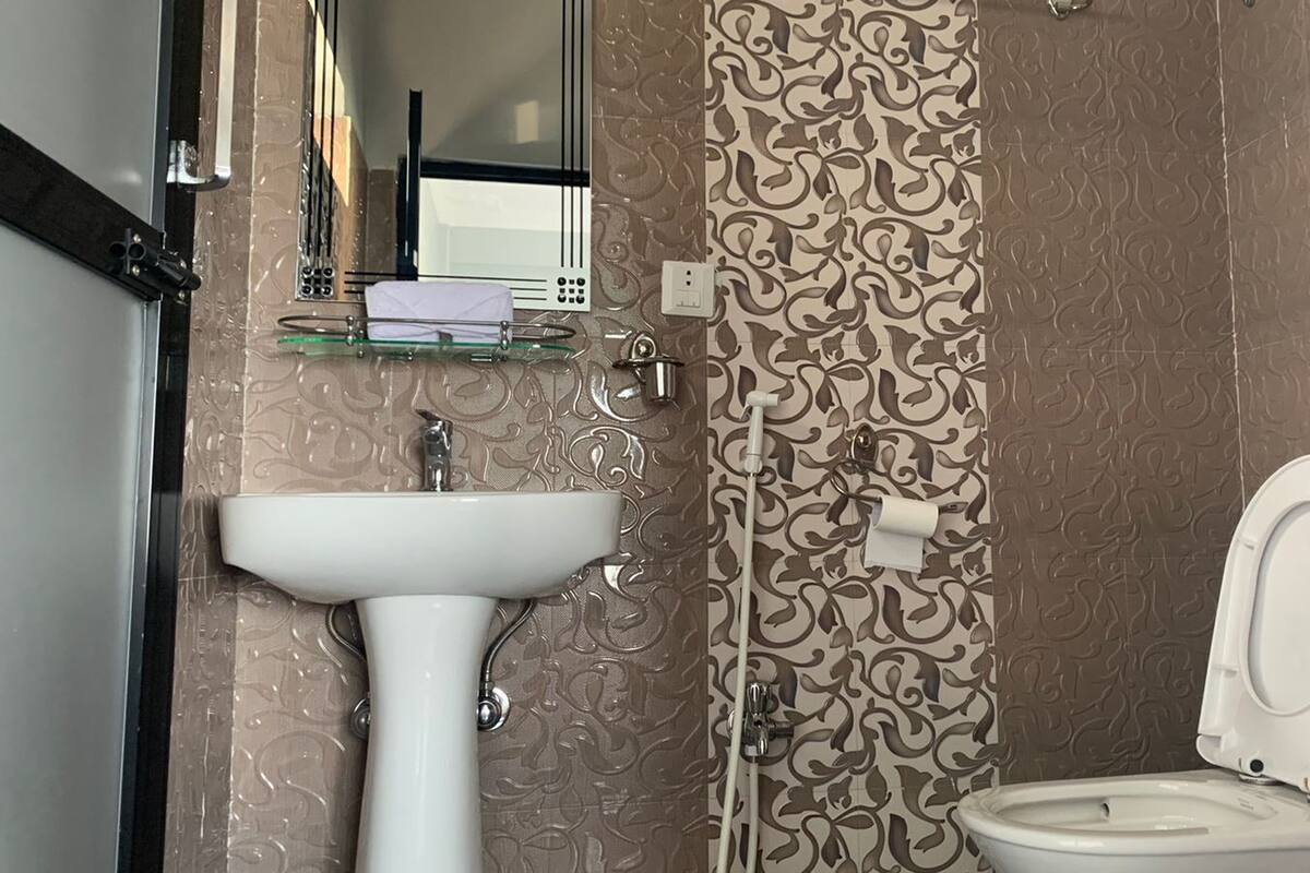 family room, multiple beds, valley view | bathroom | shower, free toiletries