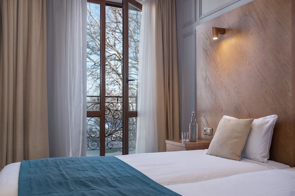 Ropa de cama de alta calidad y minibar