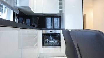 Exclusive Penthouse with Terrace and Jacuzzi | Private kitchen | Fridge, microwave, oven, stovetop