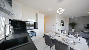 Design Two Bedroom Apartment with City View | Private kitchen | Fridge, microwave, oven, stovetop