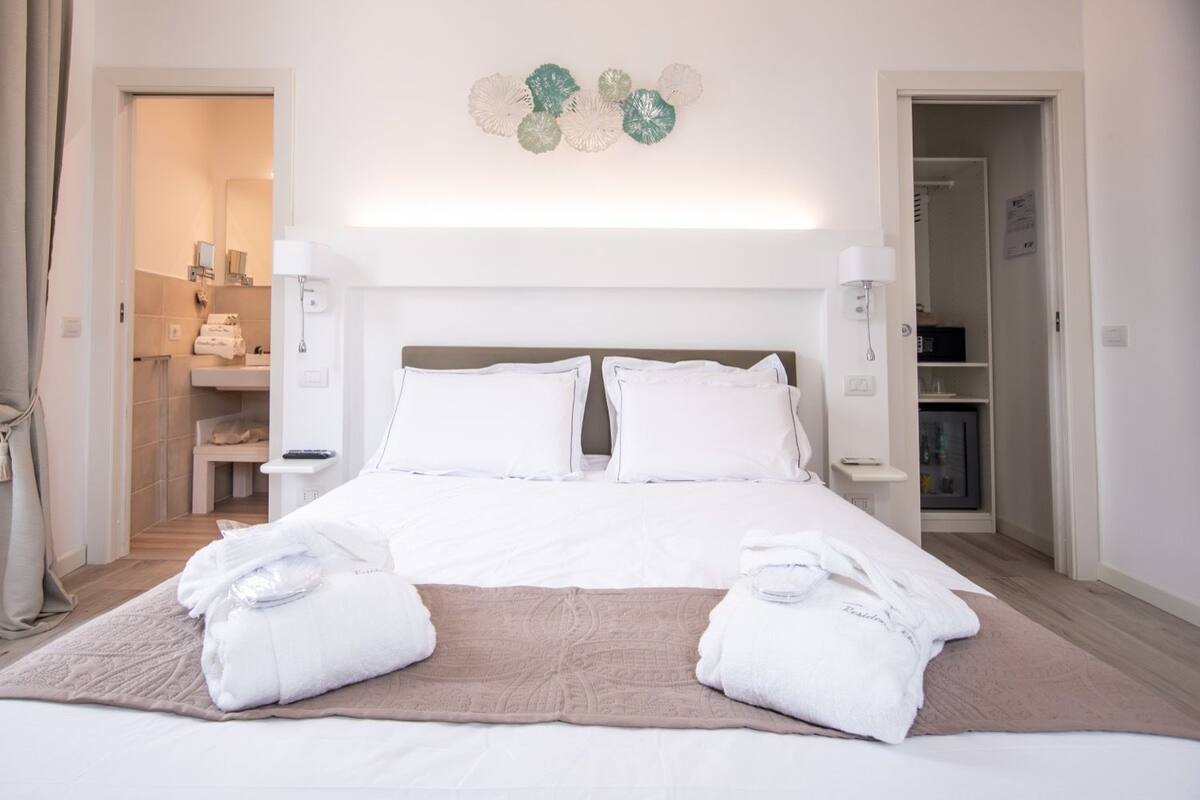 Habitación doble superior | Ropa de cama de alta calidad y edredones de plumas