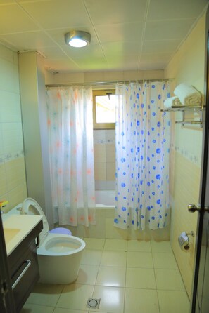 Junior Suite, 1 Double Bed | Bathroom | Deep soaking tub, towels - Rift Valley Hotel (Adama)