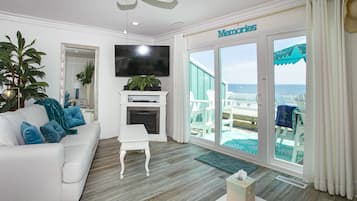 Smart TV, perapian, pemutar DVD, dan buku