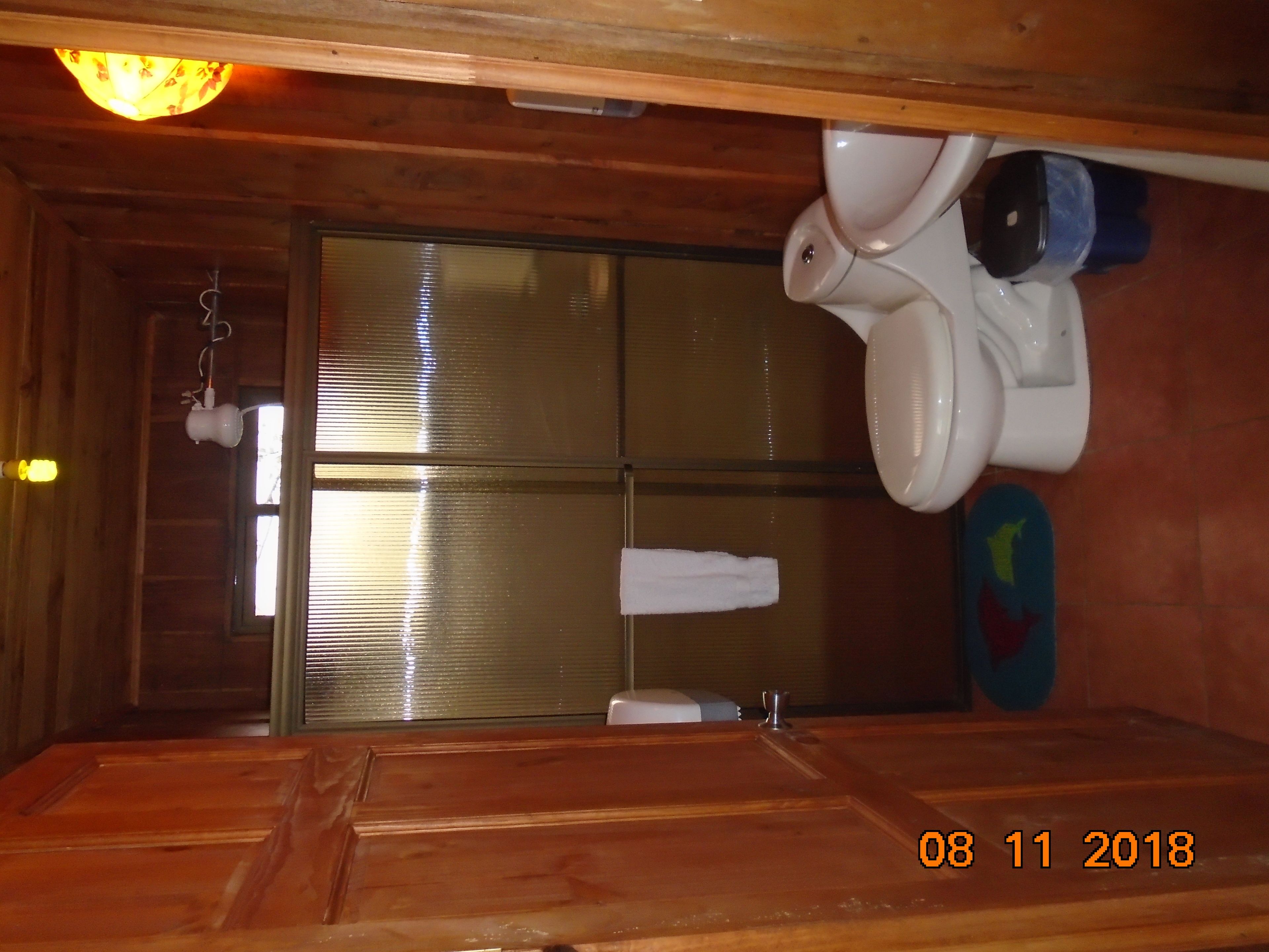 panoramic chalet, 1 king bed, accessible | bathroom | shower, towels