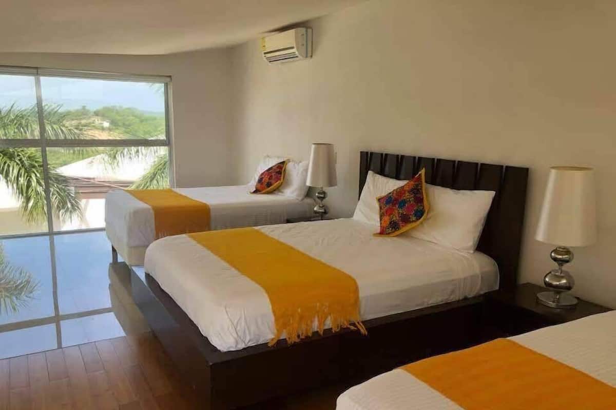 Loft Deluxe, varias camas, Terraza, vista al océano | Decoración personalizada, cortinas blackout, wifi gratis y ropa de cama