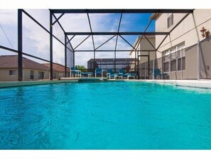Outdoor pool, a heated pool - Spacious, Private Salt Water Pool/Spa, 15 minutes to Disney & Many Attractions (Davenport)