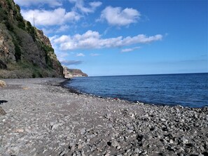 Platja a a prop, gandules de platja i tovalloles de platja