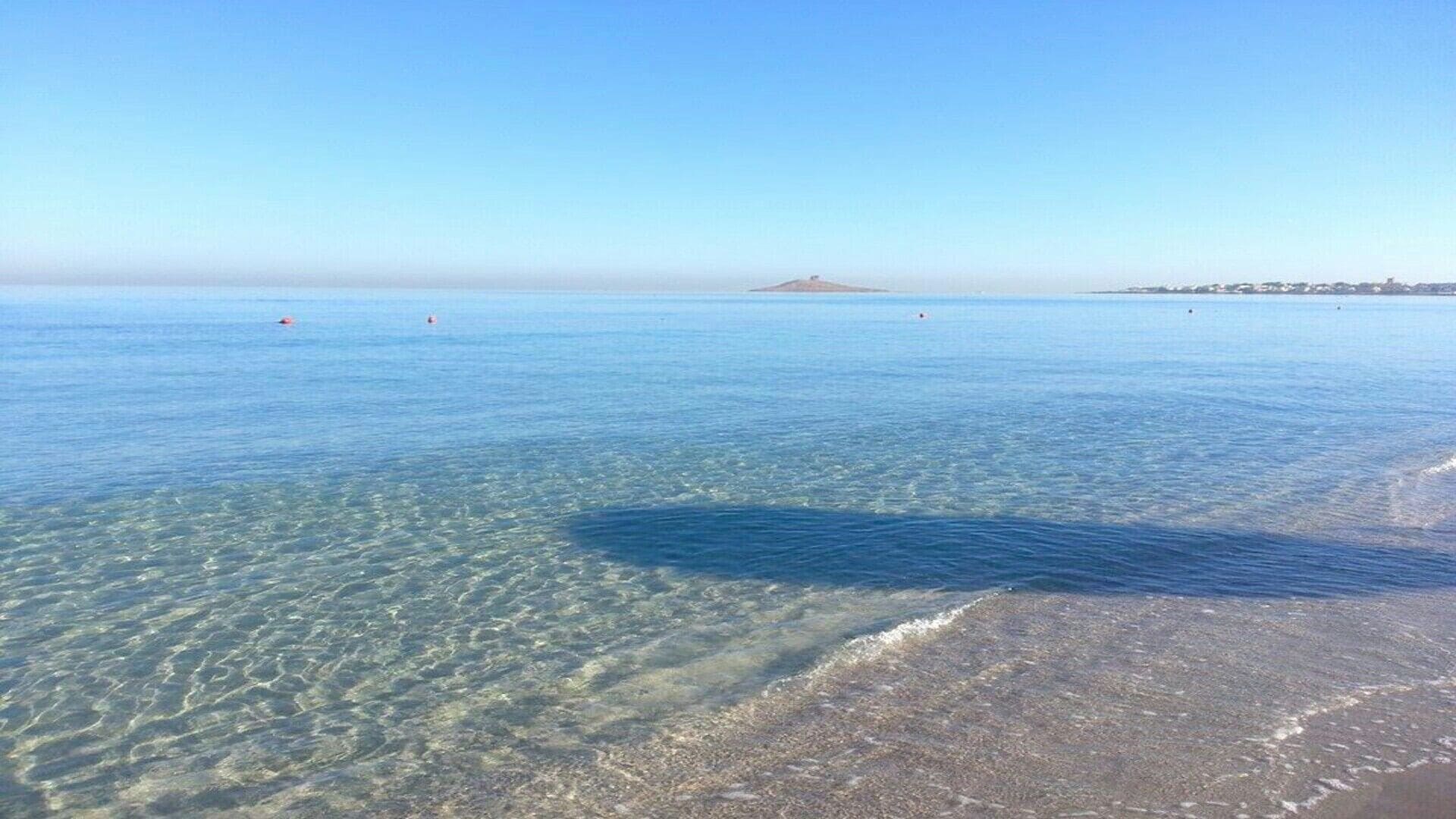 Una spiaggia nelle vicinanze, teli da spiaggia