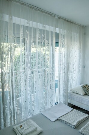 Deluxe Apartment | Individually furnished, blackout drapes, iron/ironing board, free WiFi