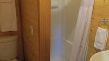 Shower, towels, soap, toilet paper